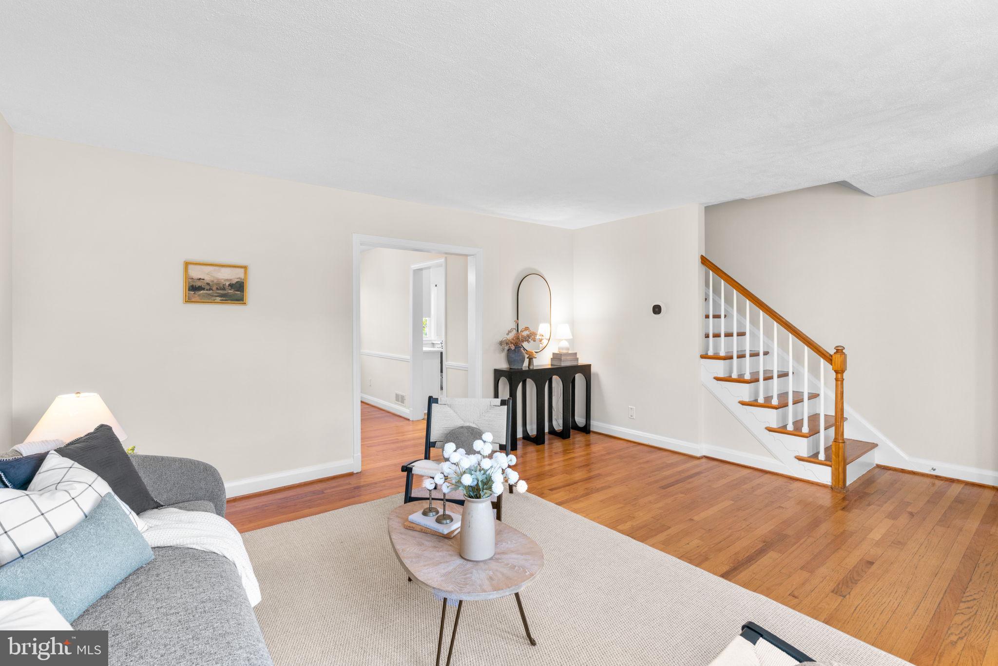 321 Stratford Road Baltimore, MD 21228 - Photo 6 of 34 a living room with furniture and wooden floor