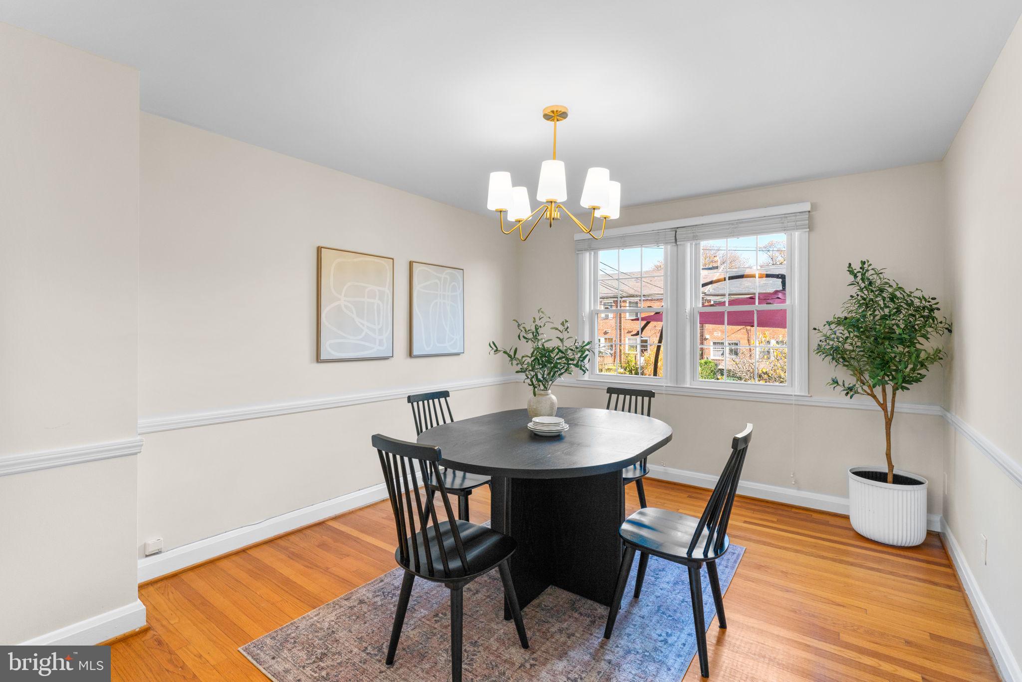321 Stratford Road Baltimore, MD 21228 - Photo 7 of 34 a view of a dining room with furniture and wooden floor