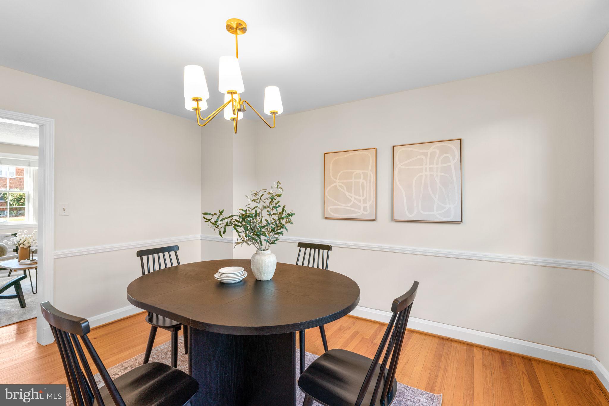 321 Stratford Road Baltimore, MD 21228 - Photo 8 of 34 a view of a dining room with furniture and wooden floor