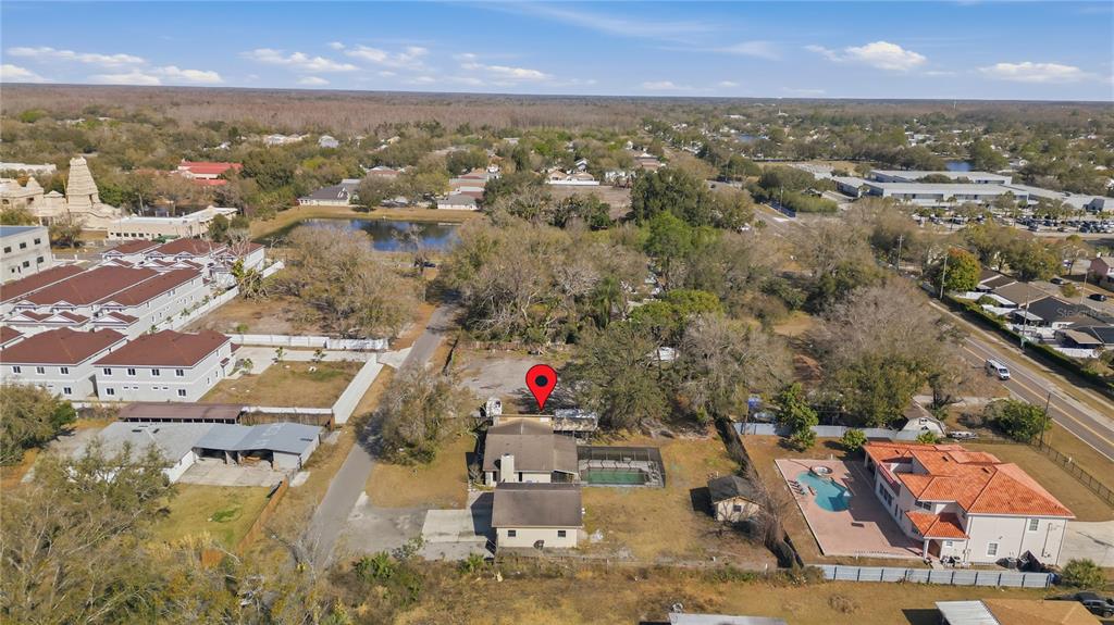 10301 Trail Ridge Lane Tampa, FL 33624 - Photo 28 of 35 an aerial view of residential houses with city view