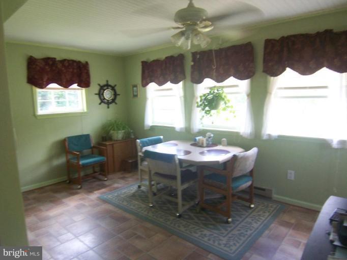 633 Ruebuck Road Bunker Hill, WV 25413 - Photo 8 of 17 Sunroom