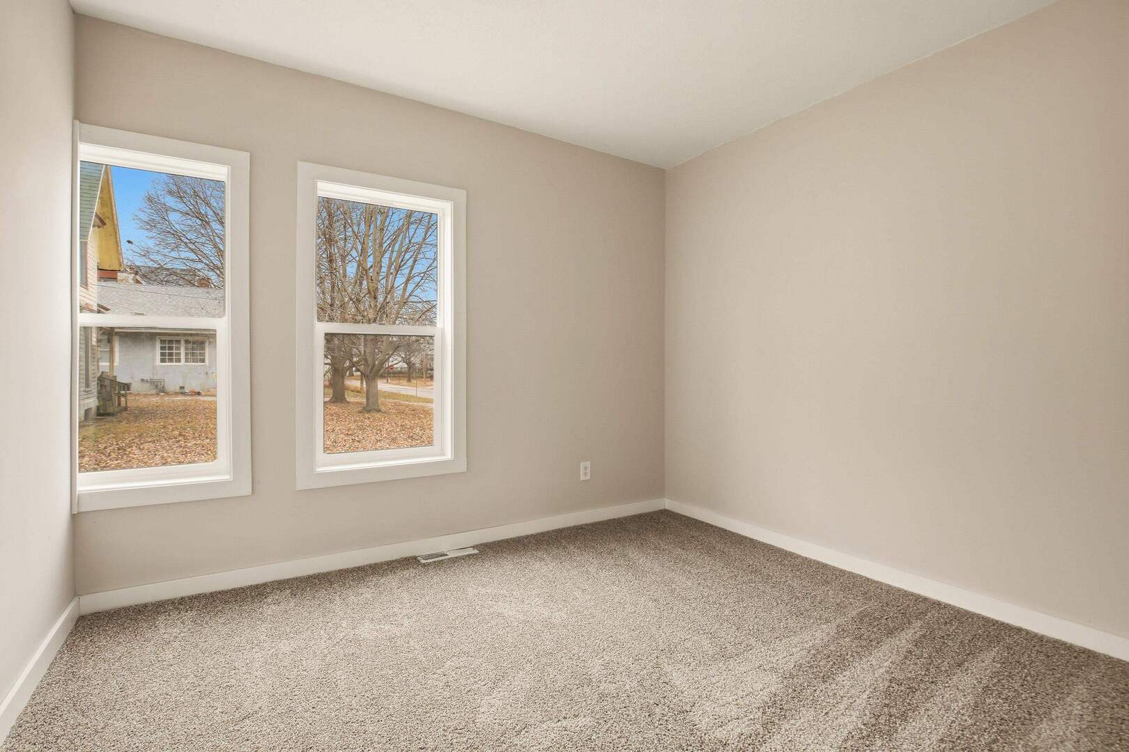 1928 8th Avenue Rock Island, IL 61201 - Photo 19 of 33 an empty room with a window