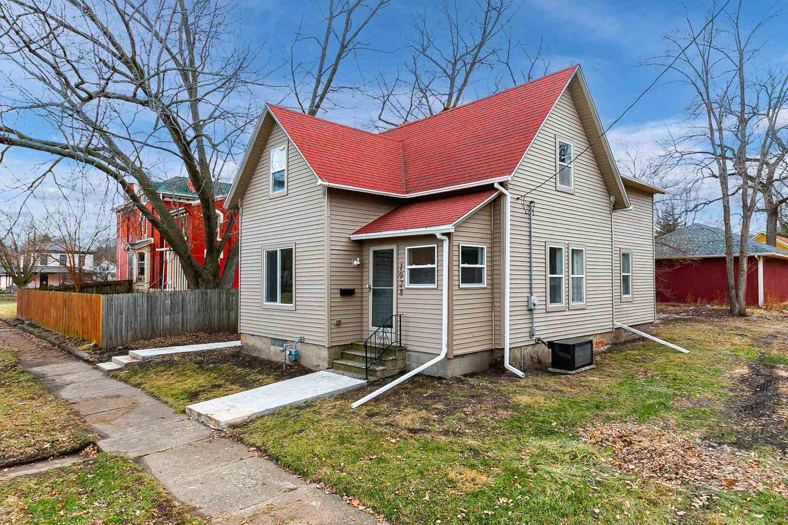 1928 8th Avenue Rock Island, IL 61201 - Photo 2 of 33 a view of a house with a yard and trees