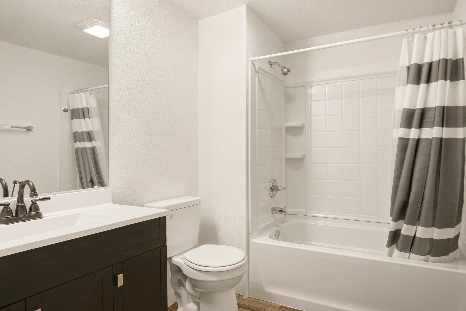 1928 8th Avenue Rock Island, IL 61201 - Photo 24 of 33 a bathroom with a sink a toilet and a bathtub