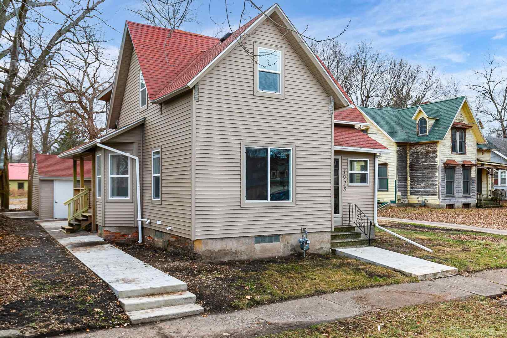1928 8th Avenue Rock Island, IL 61201 - Photo 3 of 33 a view of a house with a yard