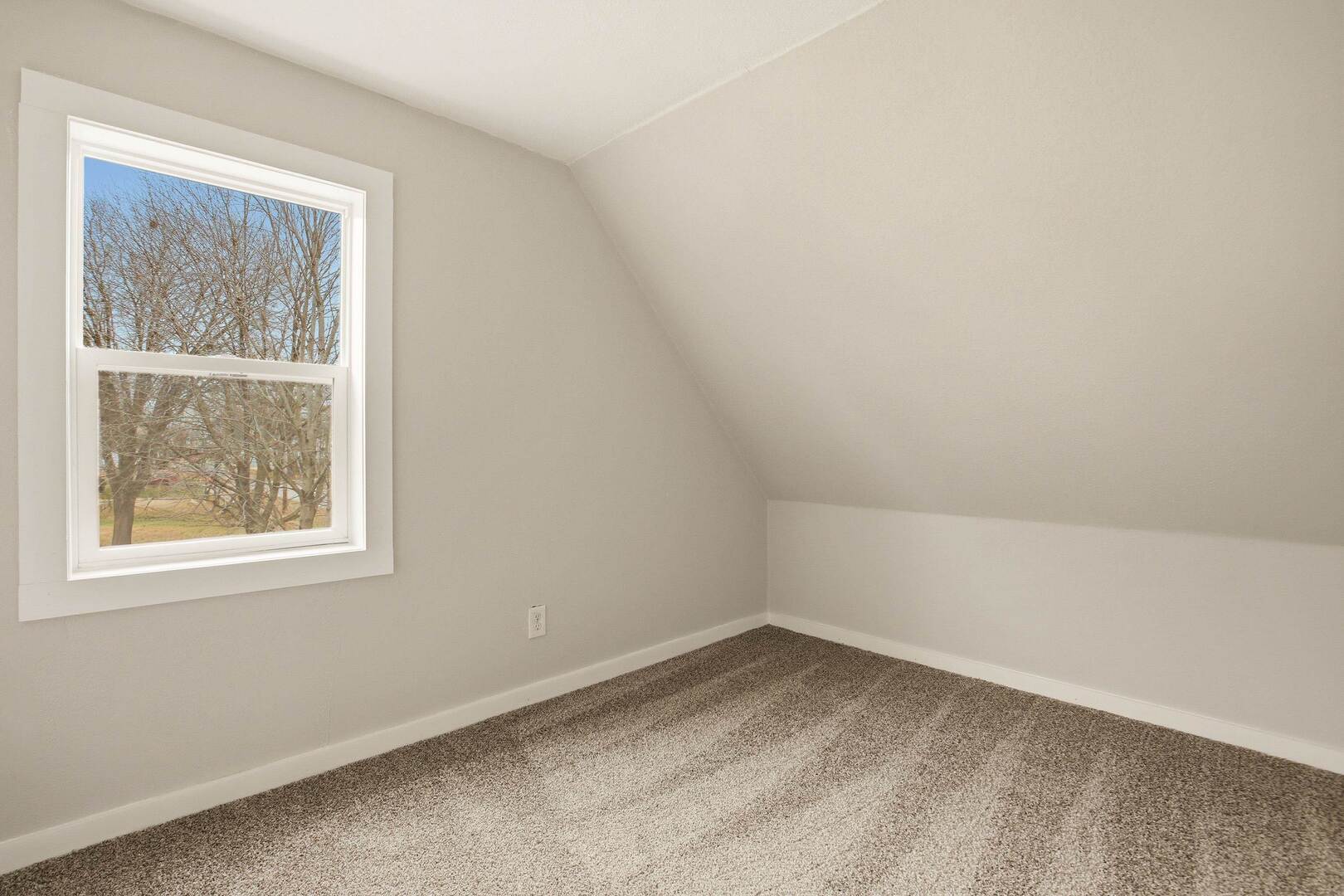 1928 8th Avenue Rock Island, IL 61201 - Photo 32 of 33 an empty room with a window