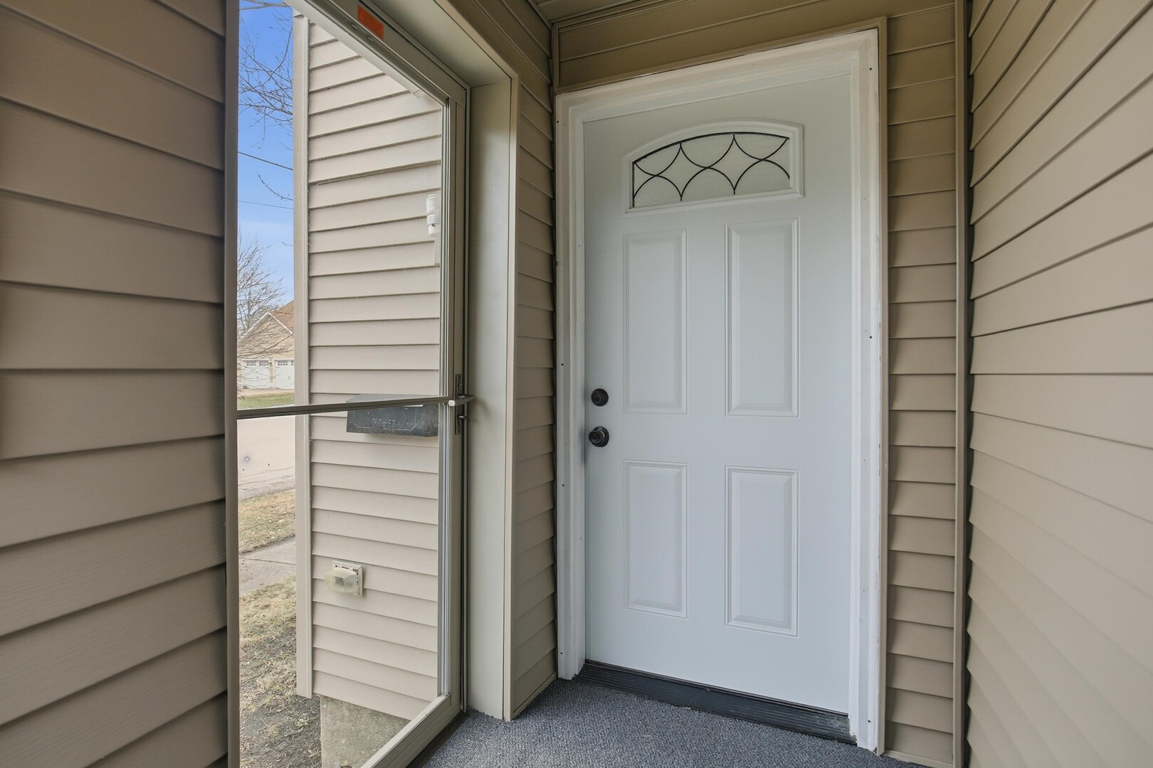 1928 8th Avenue Rock Island, IL 61201 - Photo 4 of 33 a view of front door