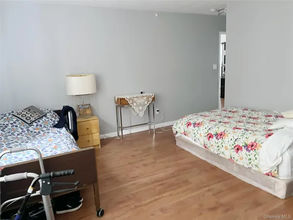 a bedroom with a bed and a table