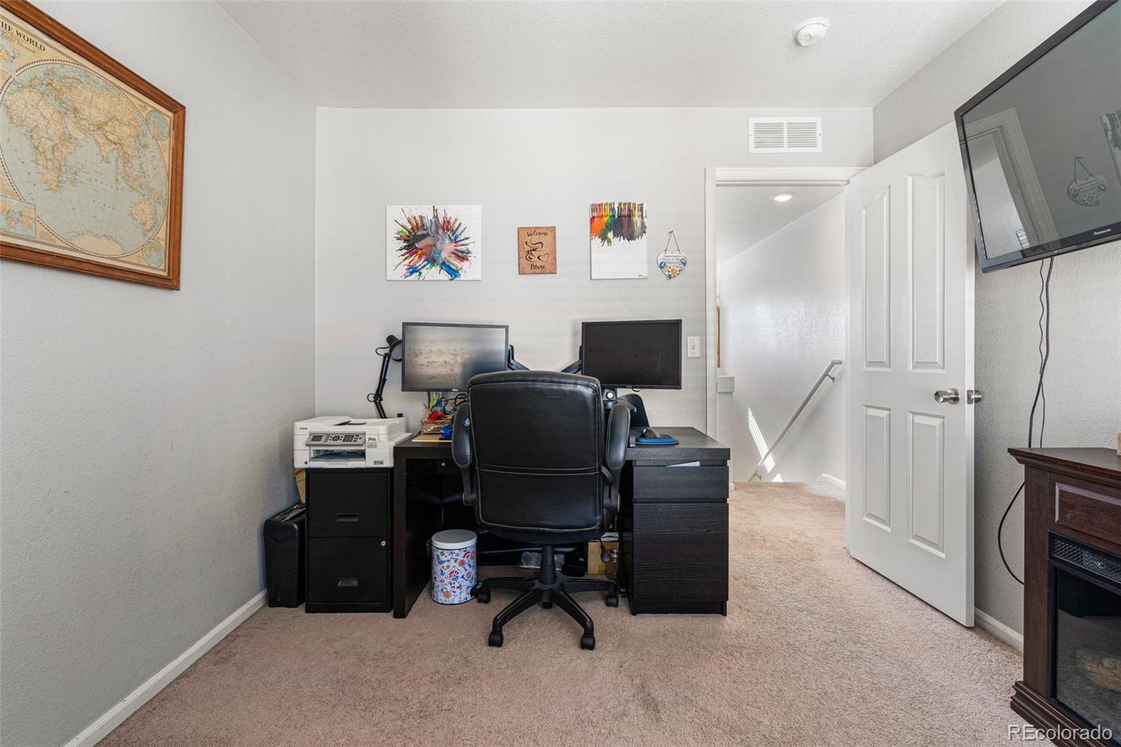 19525 Robins Drive Denver, CO 80249 - Photo 33 of 44 a view of a workspace with furniture and a window