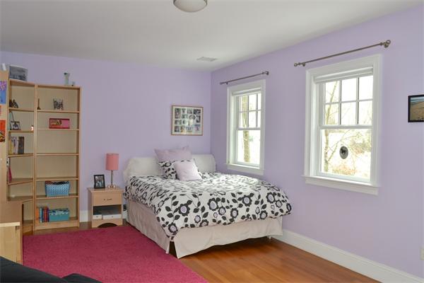 21 Dane Road Lexington, MA 02421 - Photo 19 of 25 a bedroom with a bed and a window