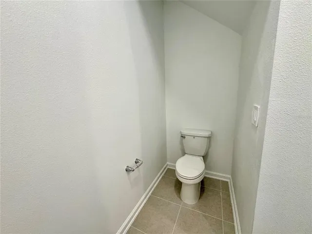 a bathroom with a toilet