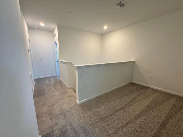 an empty room with a workbench