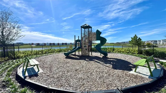 a view of a garden and basketball court