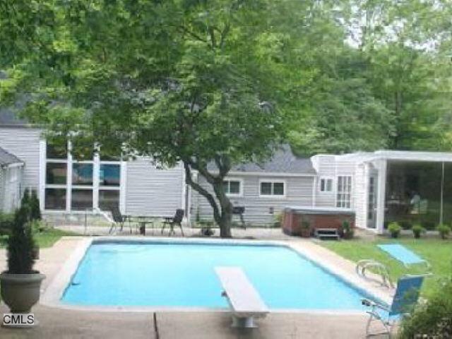 18 Briar Brae Road Stamford, CT 06903 - Photo 1 of 1 a view of house with swimming pool