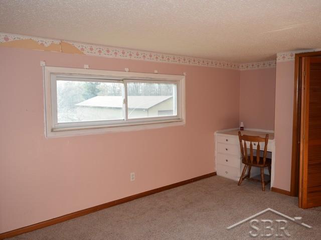 105 North Fenmore Road Merrill, MI 48637 - Photo 13 of 18 Upstairs, with built-in desk.