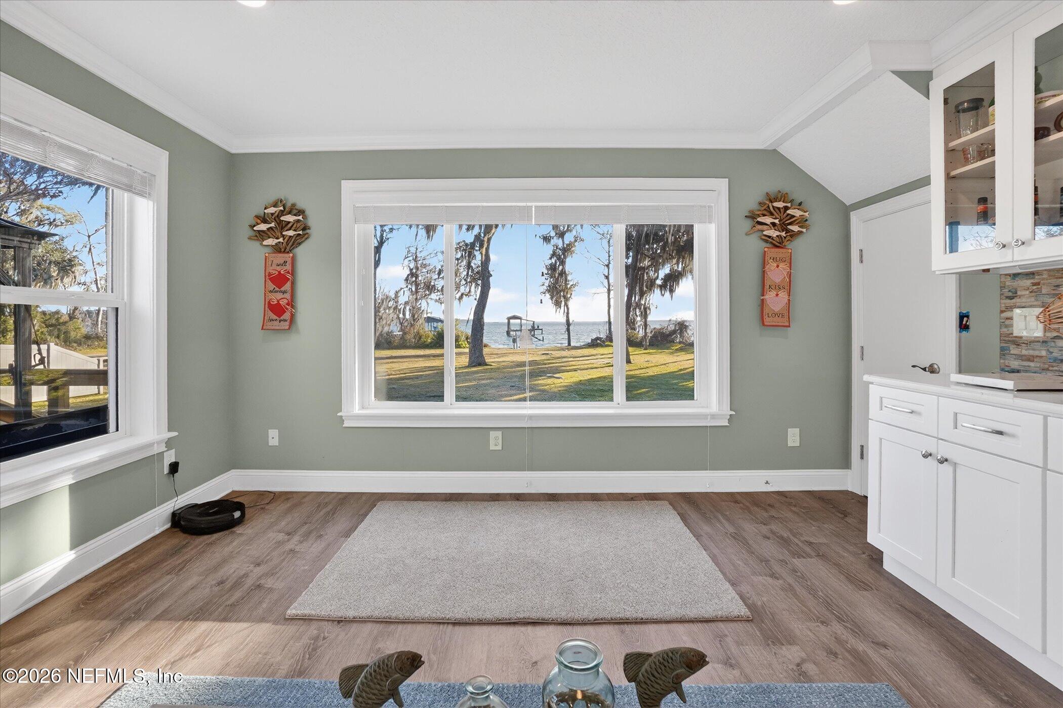 6447 Jack Wright Island Road St. Augustine, FL 32092 - Photo 15 of 37 a view of livingroom with furniture window and wooden floor