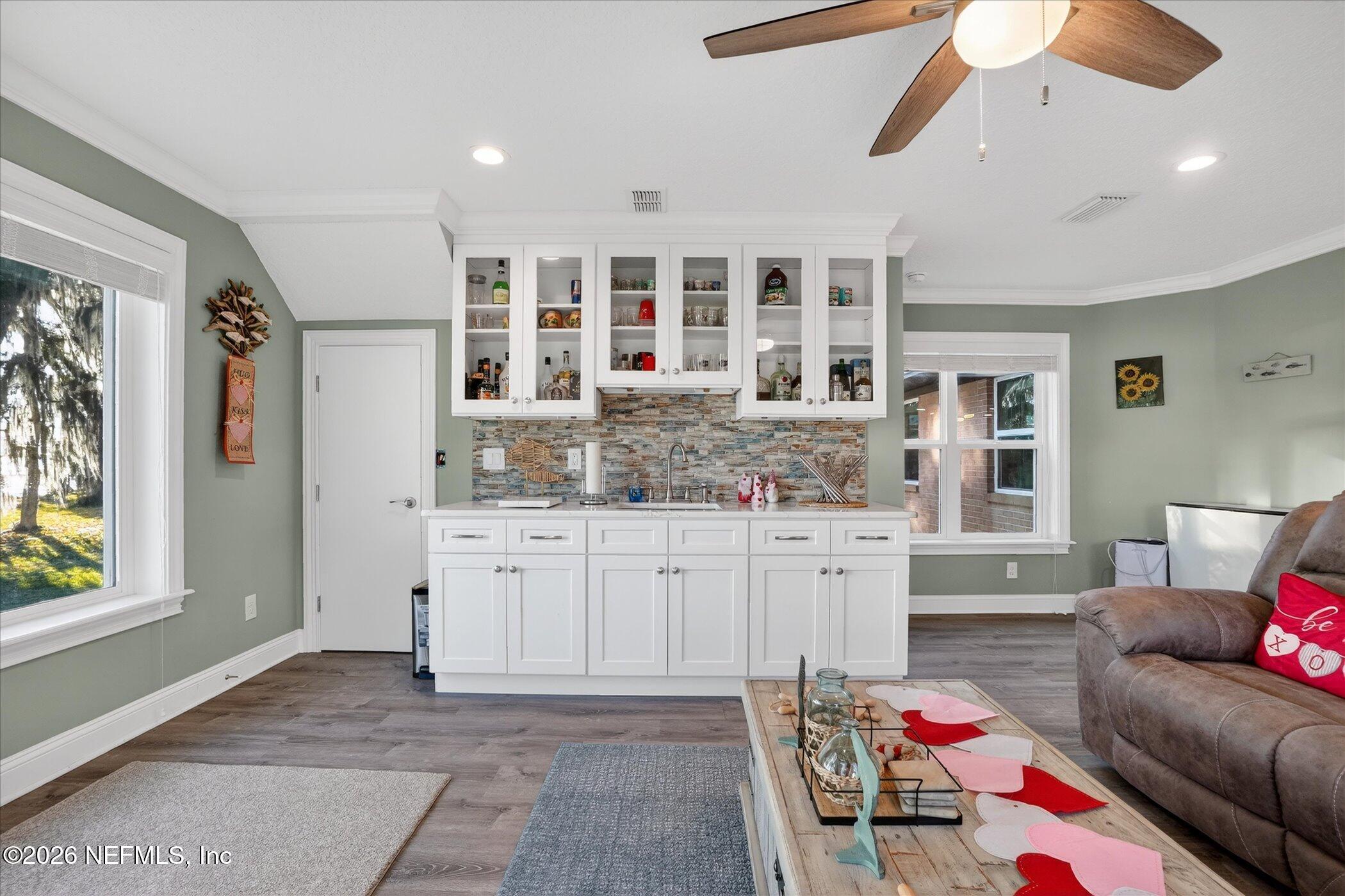 6447 Jack Wright Island Road St. Augustine, FL 32092 - Photo 17 of 37 a living room with furniture and window