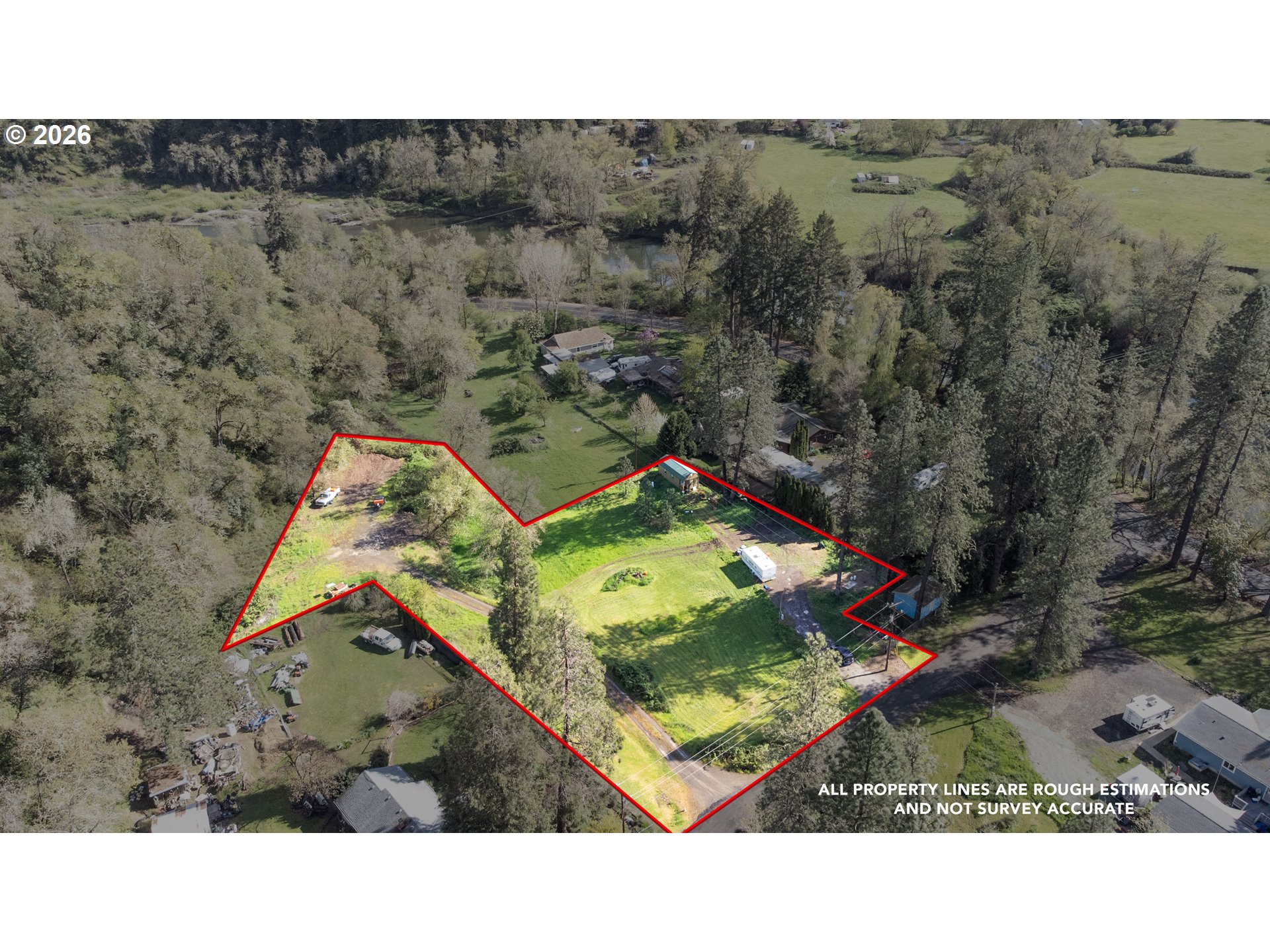 119 Winter Green Drive Riddle, OR 97469 - Photo 3 of 24 a aerial view of a house with a yard