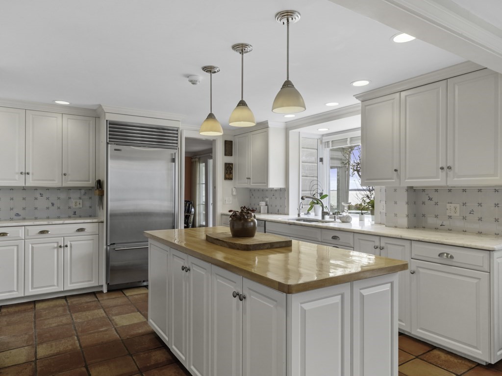 247 King Caesar Road Duxbury, MA 02332 - Photo 17 of 38 a kitchen with a sink stove and cabinets