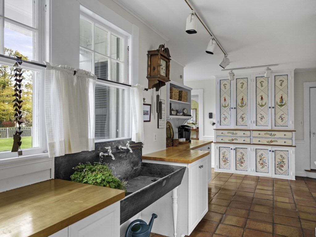 247 King Caesar Road Duxbury, MA 02332 - Photo 18 of 38 a kitchen with stainless steel appliances granite countertop a sink stove and cabinets