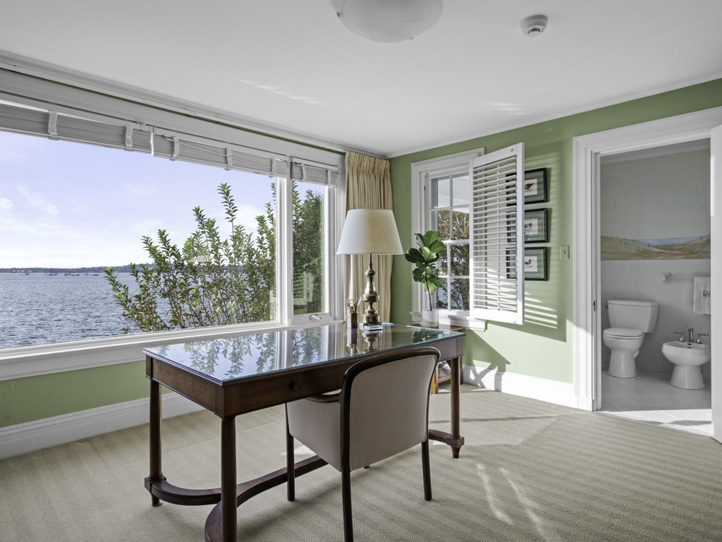 247 King Caesar Road Duxbury, MA 02332 - Photo 25 of 38 a view of a livingroom with furniture and a potted plant