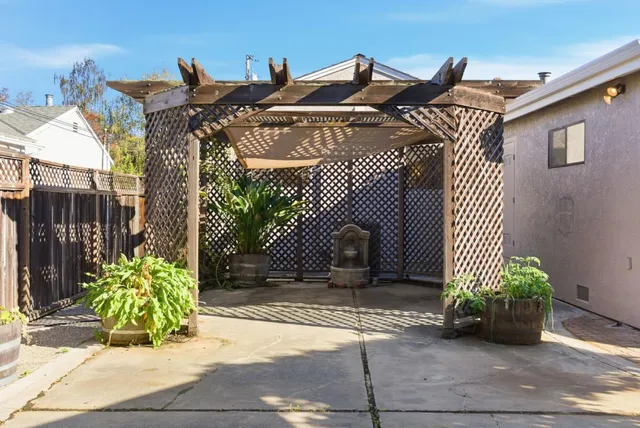 a view of a house with a street