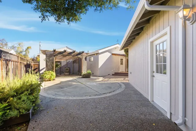 a backyard of a house with lots of green space