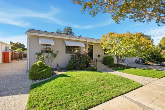 a view of a house with a swimming pool