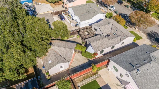 an aerial view of residential house with outdoor space