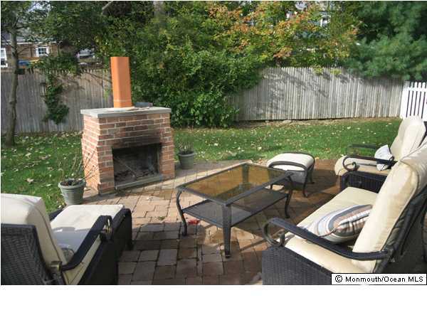 1233 Crosby Road Spring Lake Heights, NJ 07762 - Photo 3 of 3 a terrace of a house with outdoor seating
