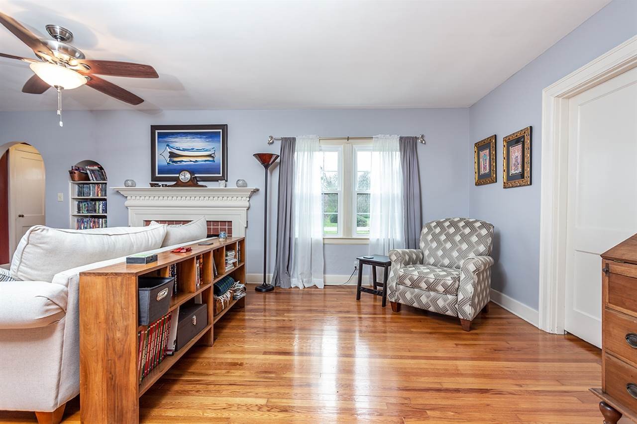 304 Georgetown Road Northwest Cleveland, TN 37311 - Photo 11 of 45 a living room with furniture and a wooden floor