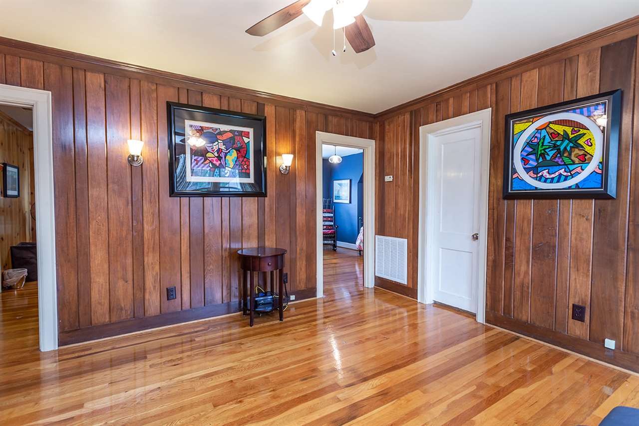 304 Georgetown Road Northwest Cleveland, TN 37311 - Photo 31 of 45 an empty room with wooden floor closet and windows