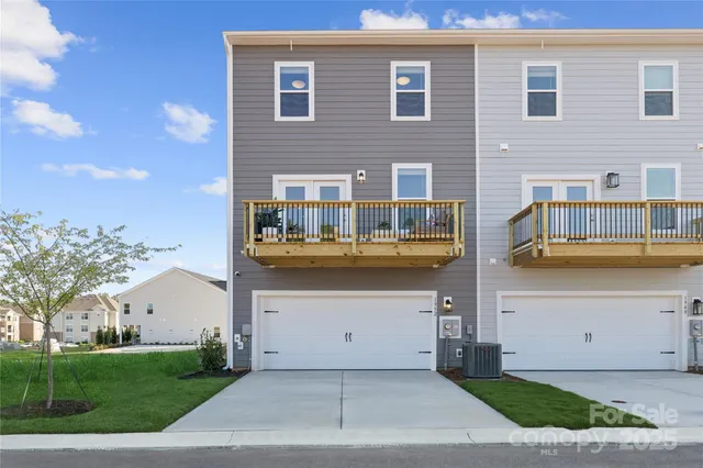 a front view of house with a yard