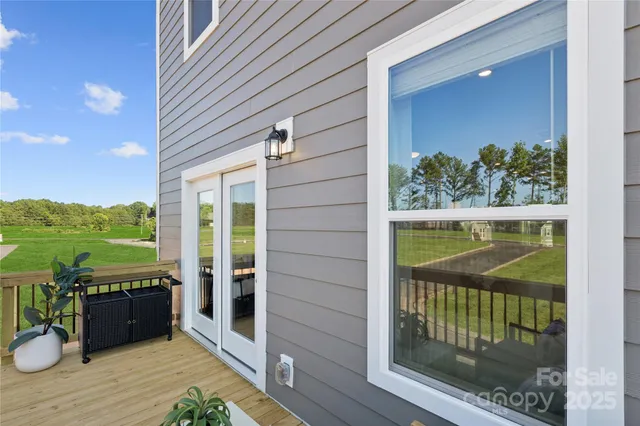 a view of a balcony with an outdoor space