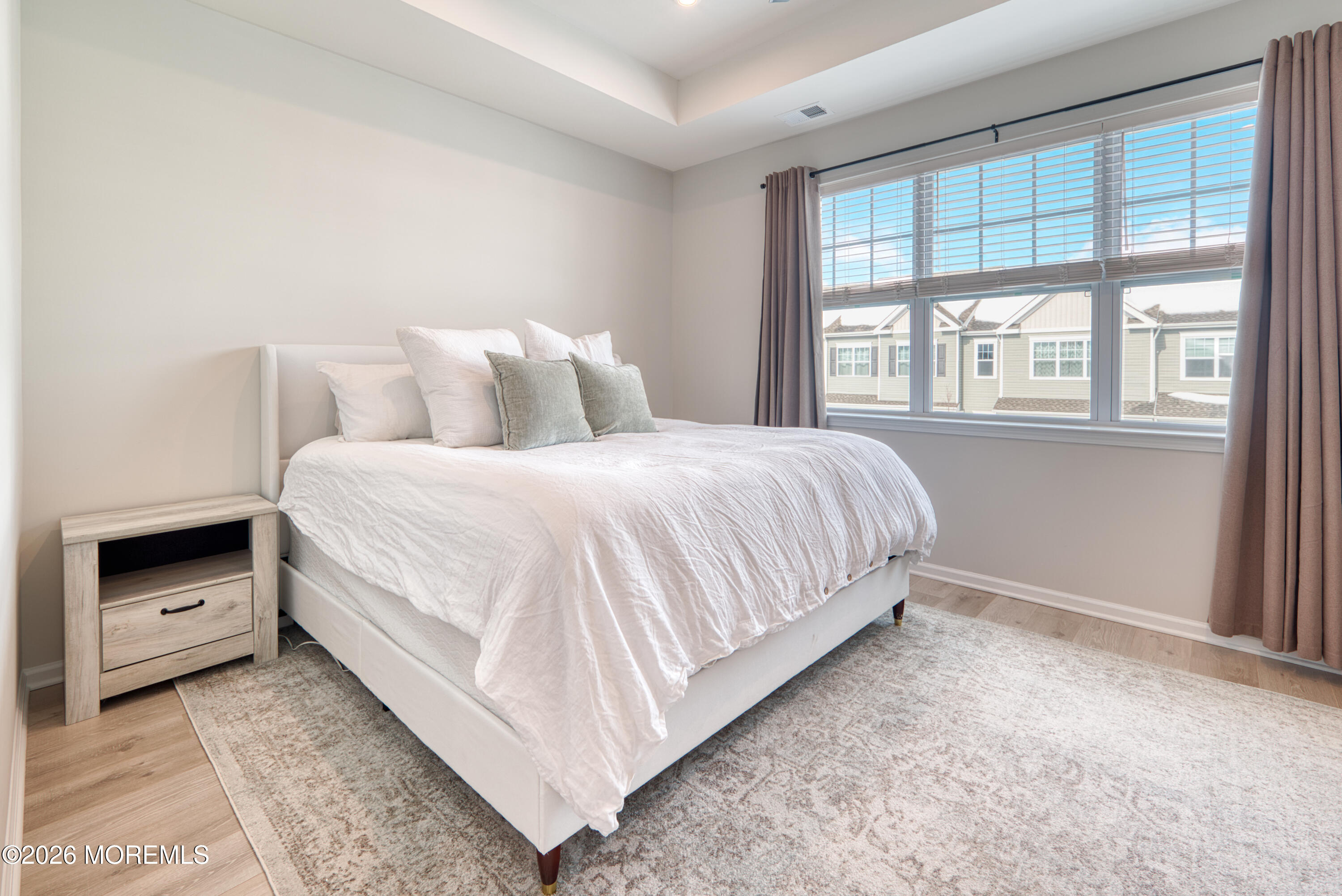 8 Laird Way Neptune, NJ 07753 - Photo 12 of 23 a bedroom with a bed and a window