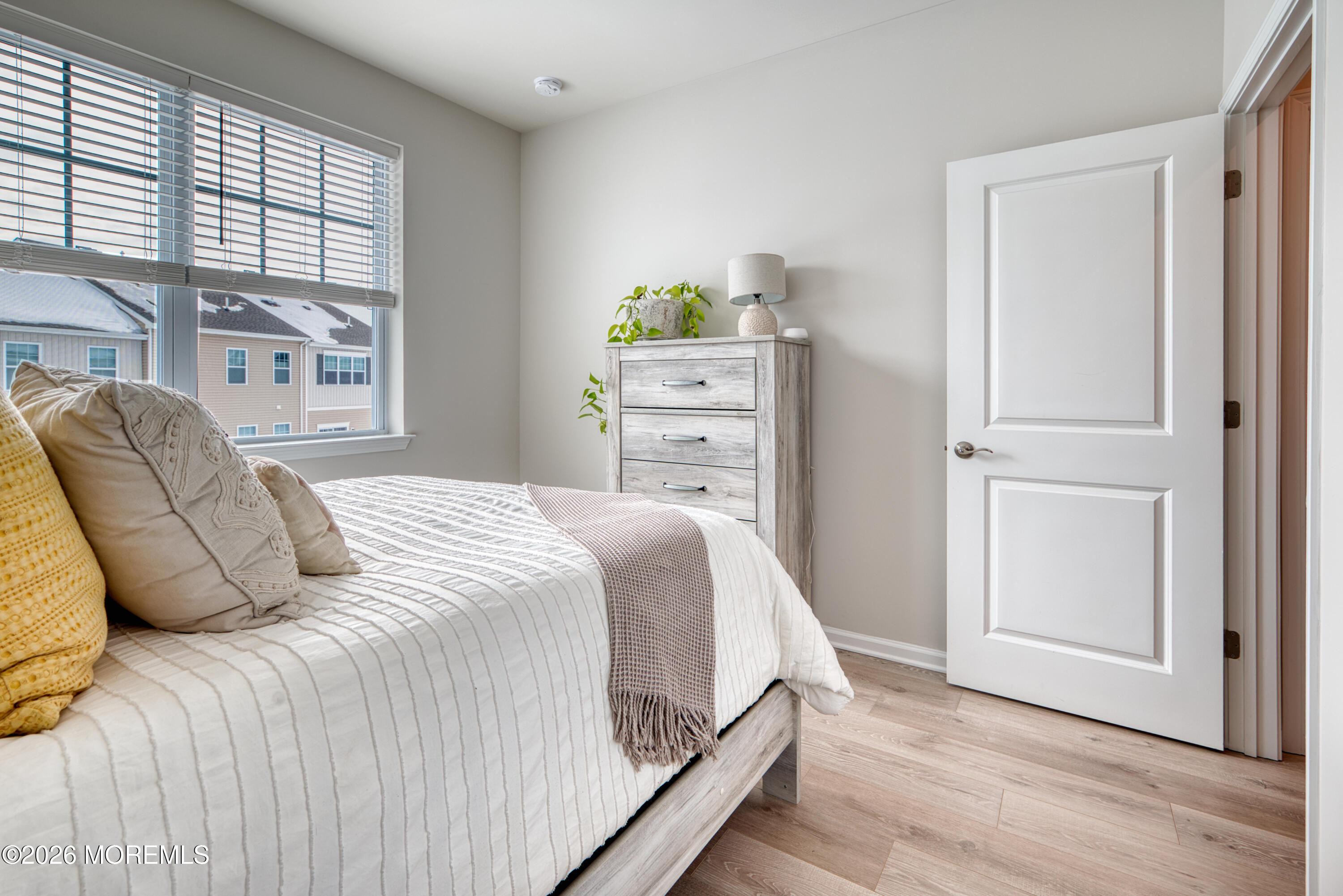 8 Laird Way Neptune, NJ 07753 - Photo 17 of 23 a bedroom with a bed and window