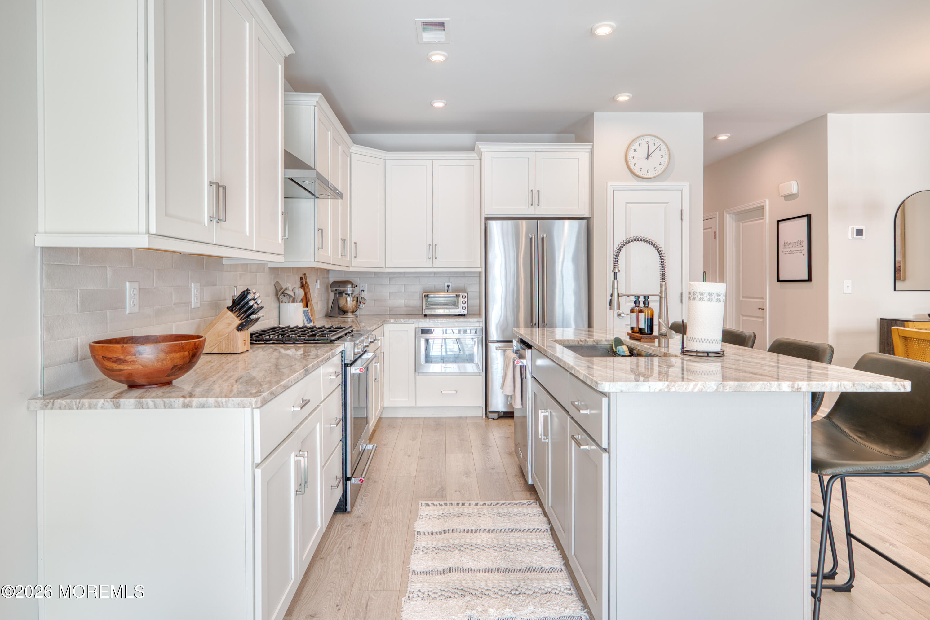 8 Laird Way Neptune, NJ 07753 - Photo 23 of 23 a kitchen with a sink stove and cabinets