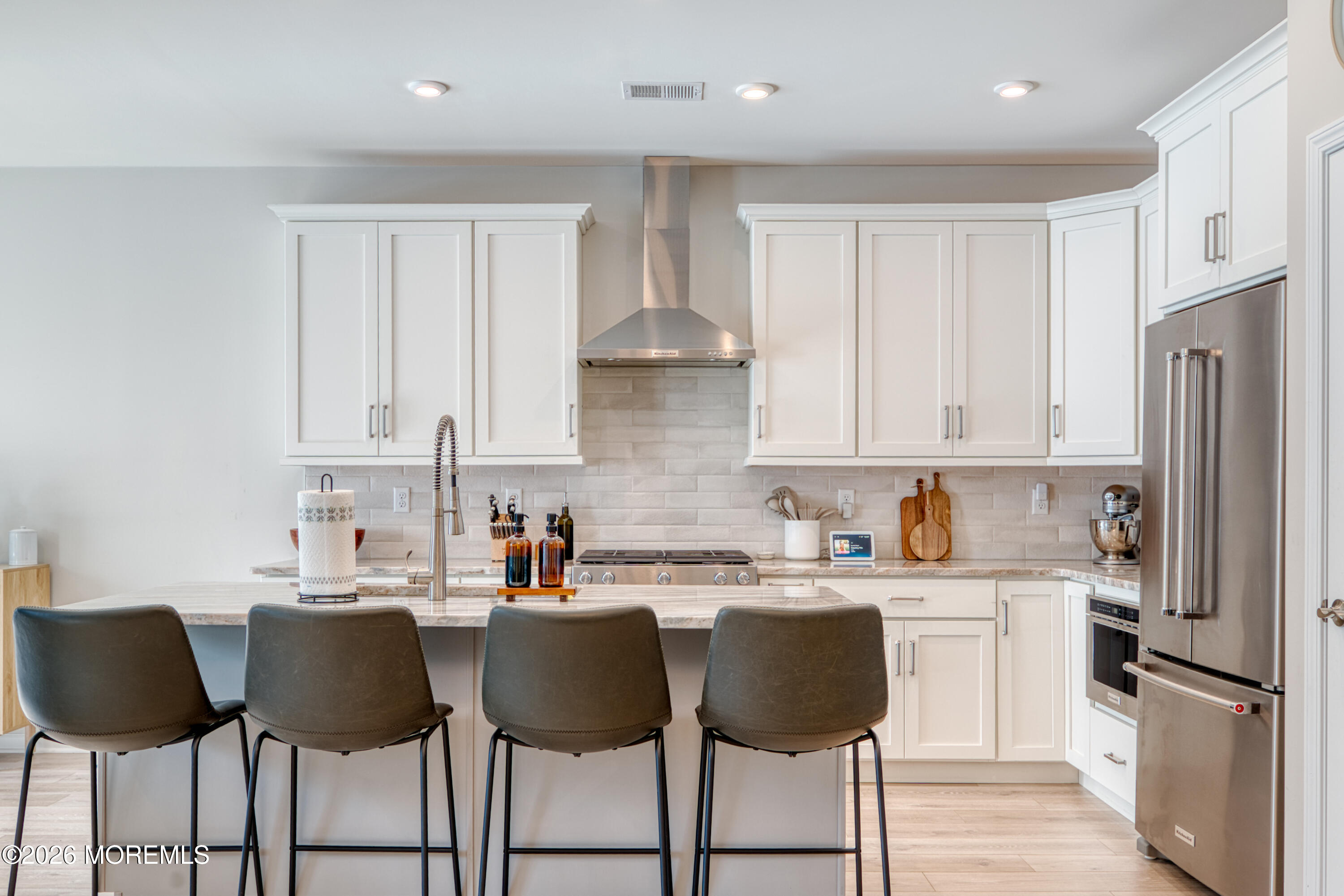 8 Laird Way Neptune, NJ 07753 - Photo 4 of 23 a kitchen with stainless steel appliances a refrigerator sink and cabinets