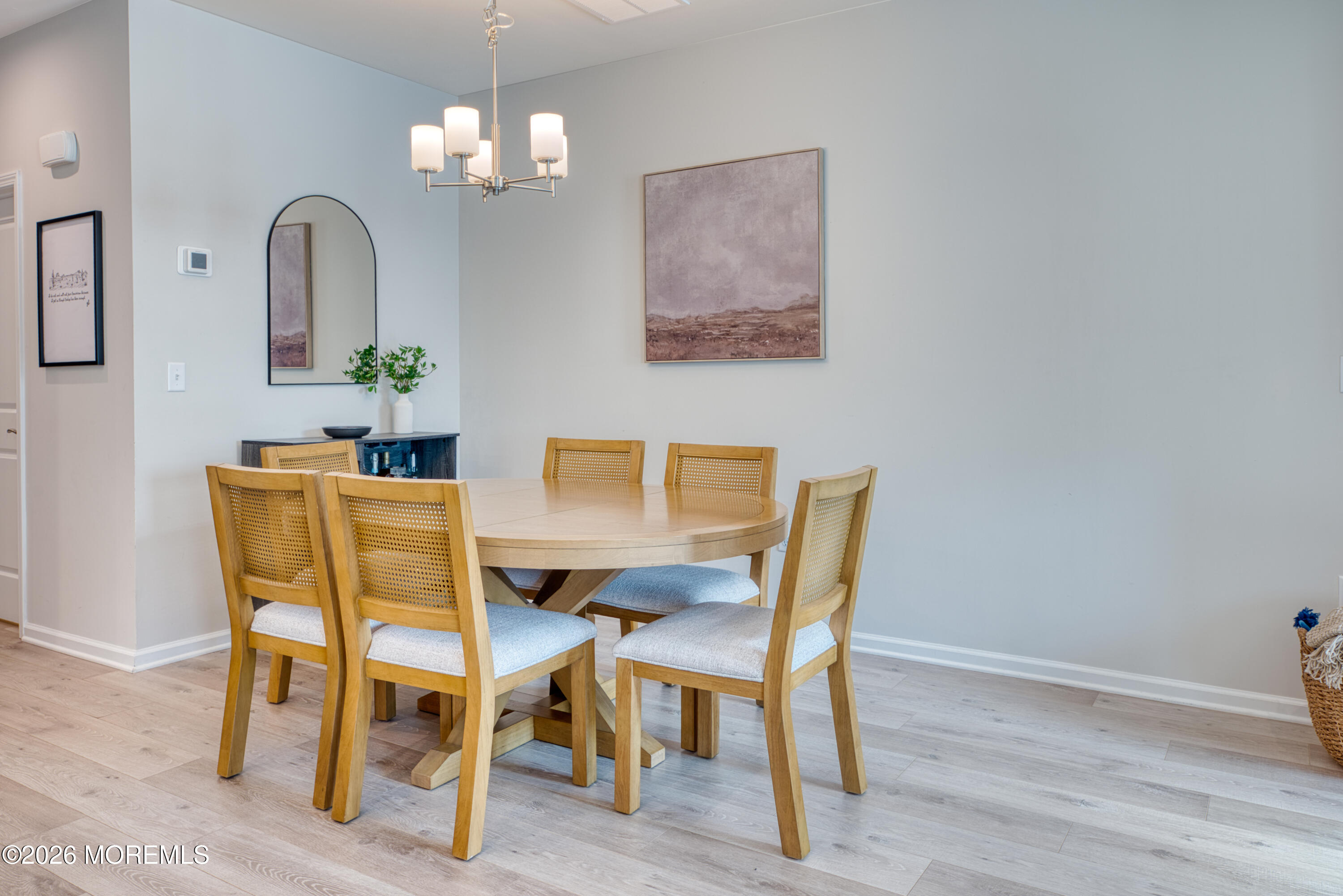 8 Laird Way Neptune, NJ 07753 - Photo 5 of 23 a view of a dining room with furniture and wooden floor