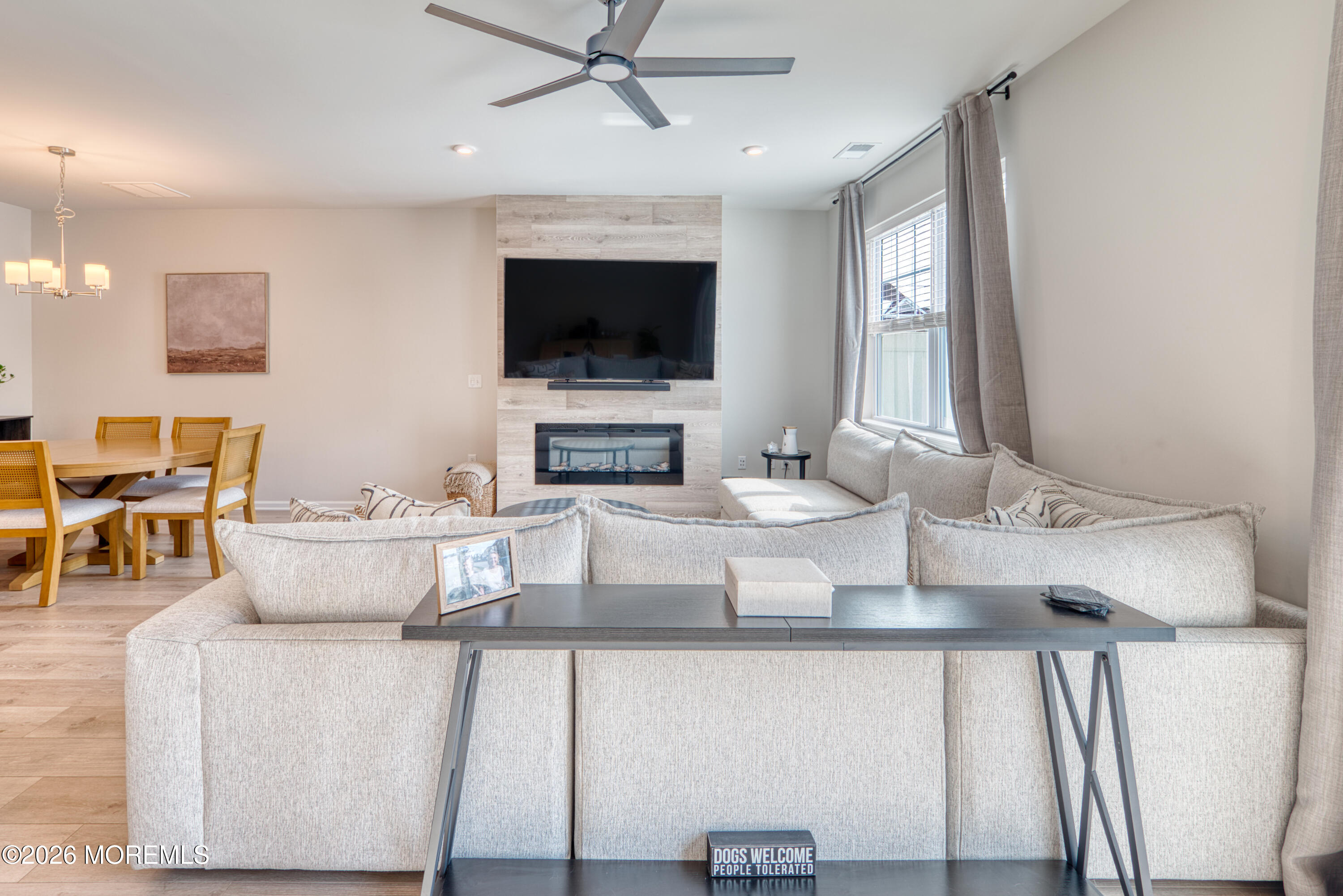 8 Laird Way Neptune, NJ 07753 - Photo 6 of 23 a living room with furniture and a flat screen tv