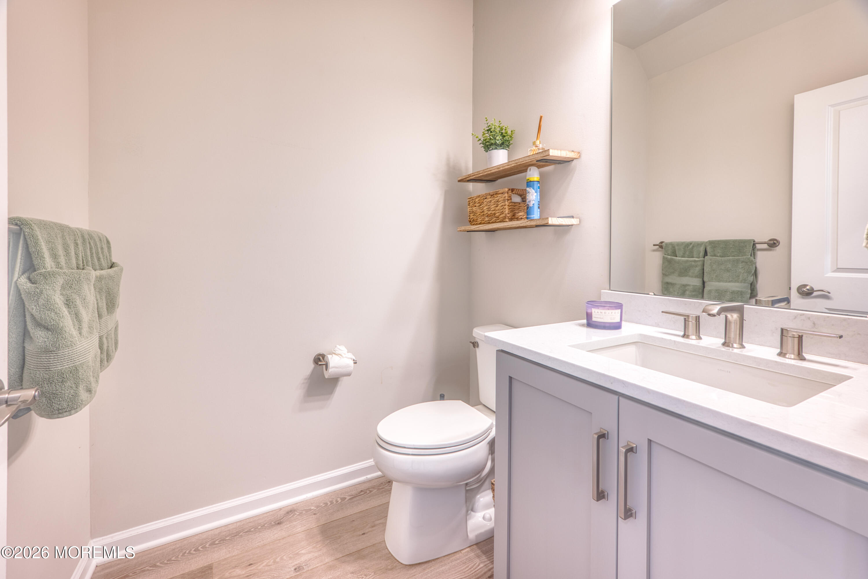 8 Laird Way Neptune, NJ 07753 - Photo 10 of 23 a bathroom with a granite countertop toilet sink and mirror