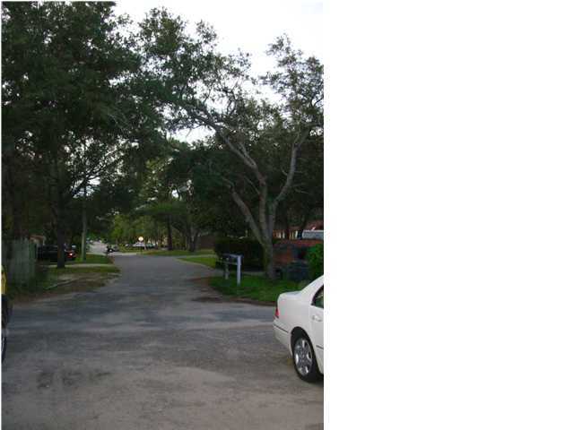 44 Berwick Circle, Unit 2 Shalimar, FL 32579 - Photo 12 of 12 a view of a street with of trees