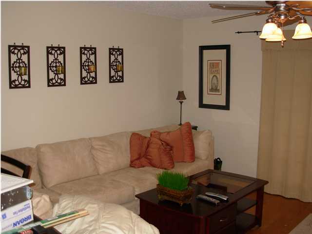 44 Berwick Circle, Unit 2 Shalimar, FL 32579 - Photo 4 of 12 a living room with furniture and a couch