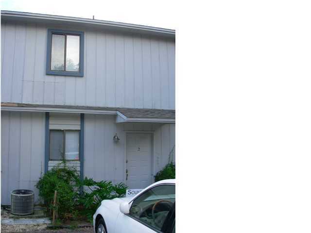 44 Berwick Circle, Unit 2 Shalimar, FL 32579 - Photo 10 of 12 a house view with a outdoor space