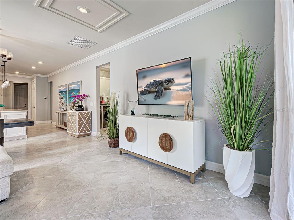 13836 Campoleone Street Venice, FL 34293 - Photo 22 of 99 a view of livingroom with furniture and a potted plant