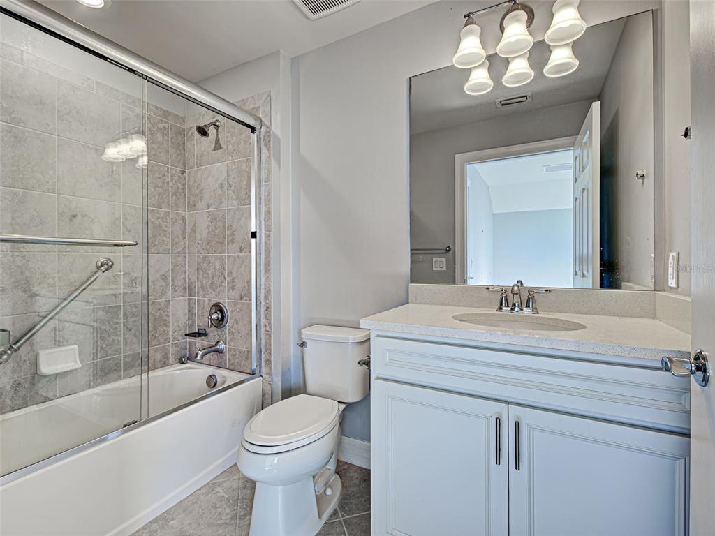 13836 Campoleone Street Venice, FL 34293 - Photo 40 of 99 a bathroom with a sink a toilet and a bathtub