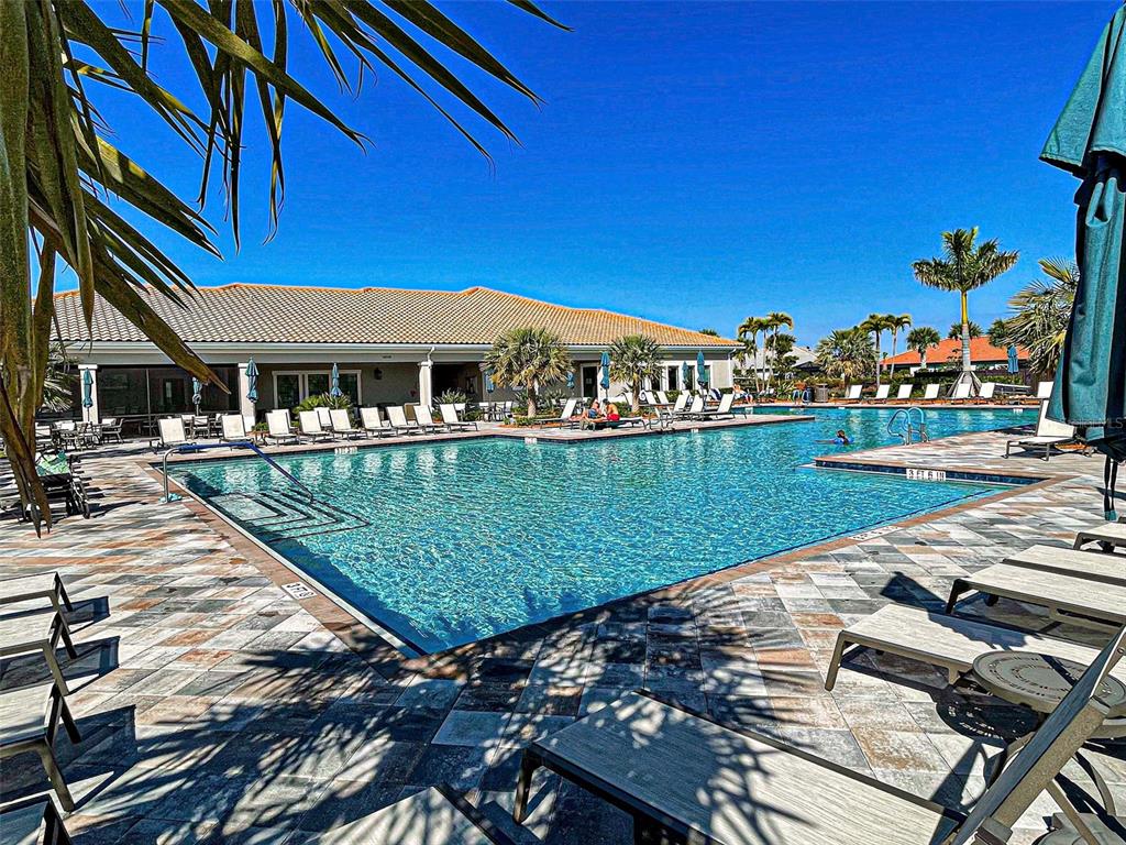 13836 Campoleone Street Venice, FL 34293 - Photo 75 of 99 a view of a house with a yard