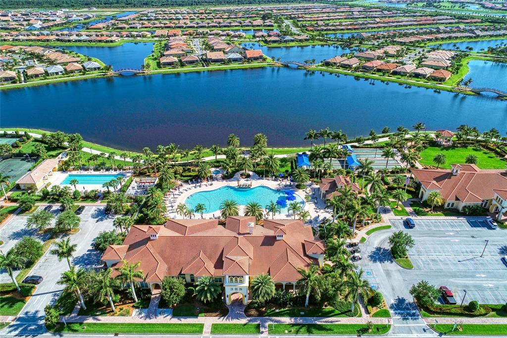 13836 Campoleone Street Venice, FL 34293 - Photo 78 of 99 an aerial view of lake and residential houses with outdoor space and swimming pool