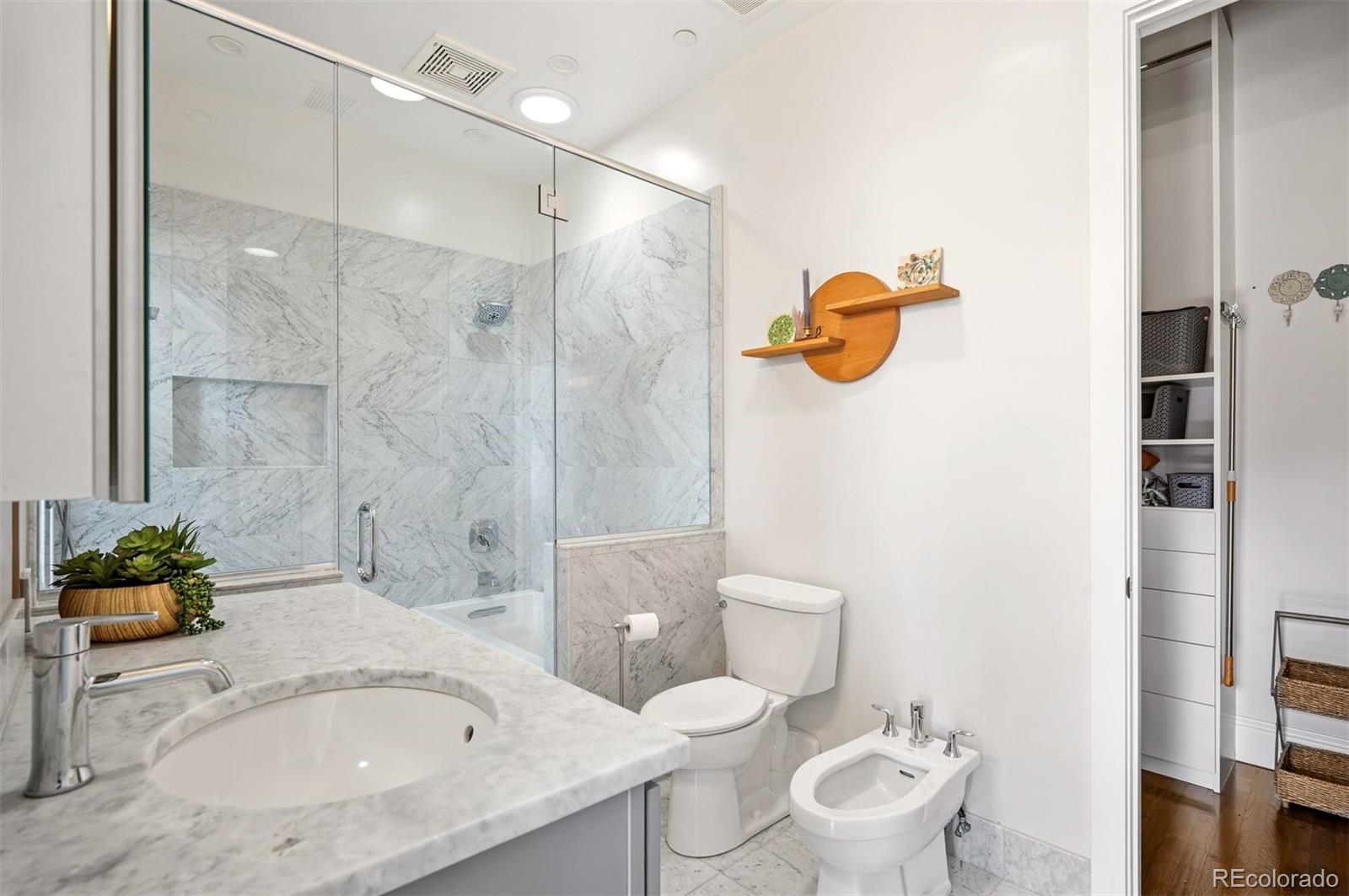 1501 Wazee Street, Unit 4B Denver, CO 80202 - Photo 17 of 49 a bathroom with a sink and a shower