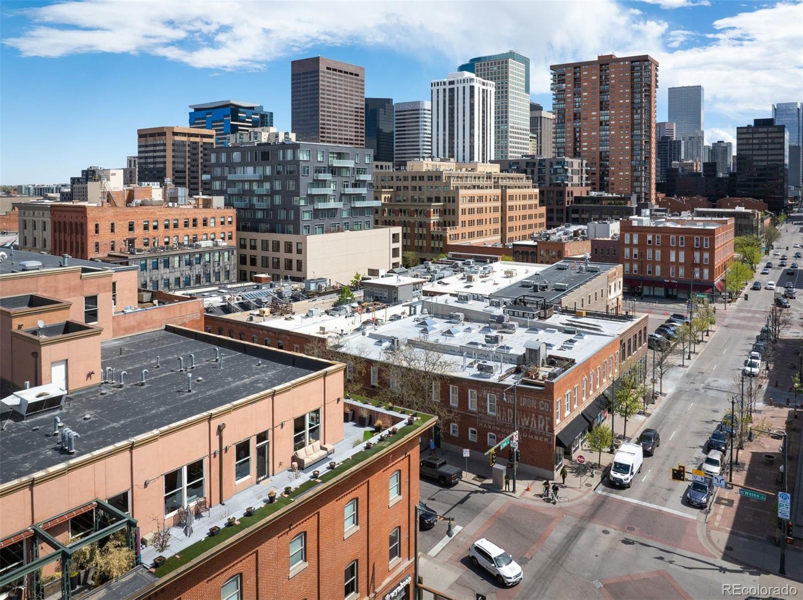 1501 Wazee Street, Unit 4B Denver, CO 80202 - Photo 36 of 49 a city view with tall buildings